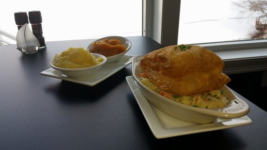 Indulge in the Chicken Pot Pie Entree that comes with two sides of your choice