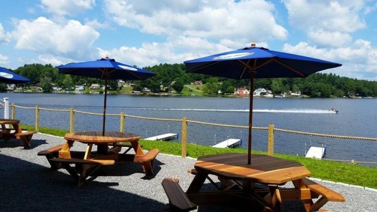 Outdoor dining seating allows for a comfortable view of Lake Lashaway at 308 Lakeside