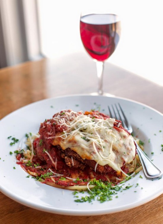 Chicken Parmesan at 308 Lakeside is a Panko encrusted chicken breast topped with marinara sauce and melted mozzarella, served over choice of pasta