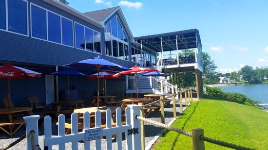 Outdoor dining seating allows for a comfortable view of Lake Lashaway at 308 Lakeside