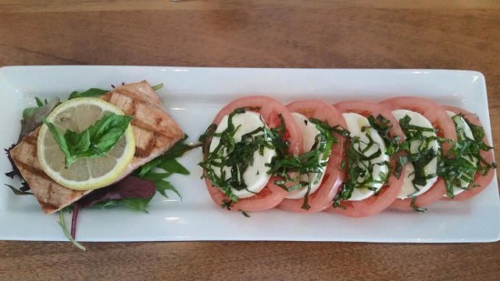 The Caprese Salad at 308 Lakeside is layered with beefsteak tomatoes, has fresh mozzarella cheese, basil, and drizzled with extra virgin olive oil